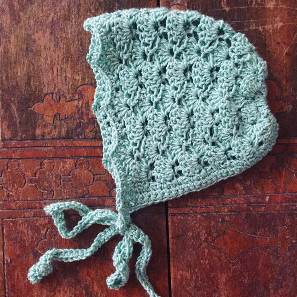 Handmade sea foam baby bonnet